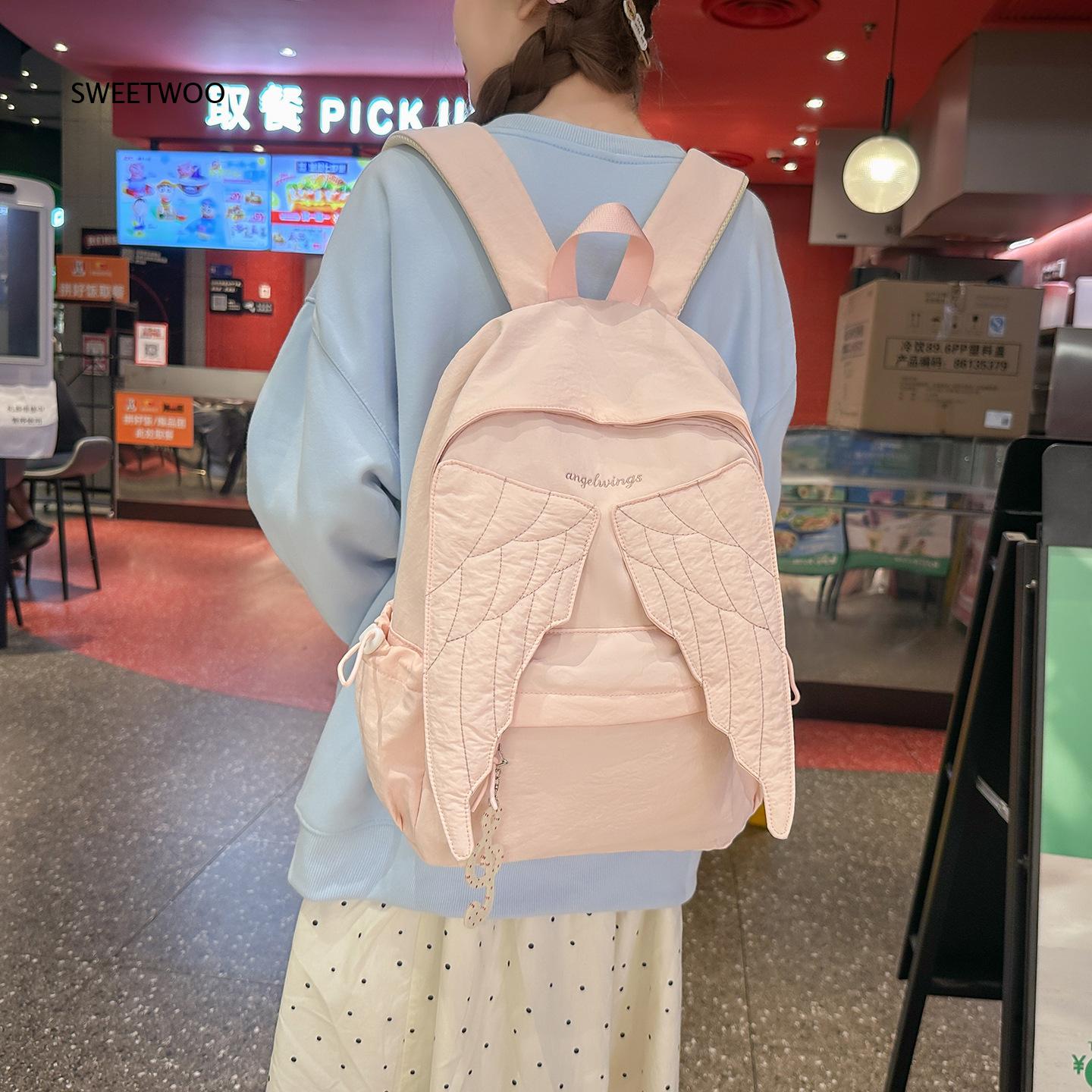 Embroidery And Quilting - 女性用ピンクエンジェルウィングリュックサック、キルト加工の翼刺繍入り、軽量ナイロン製、カジュアル、学校、日常、旅行用バックパック
