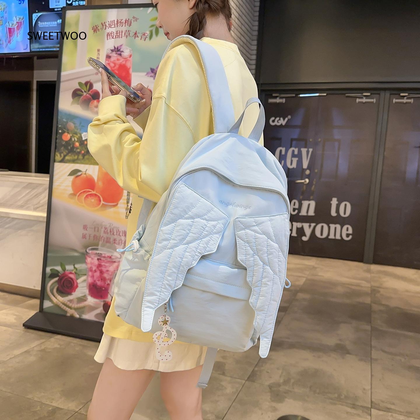 女性用ピンクエンジェルウィングリュックサック、キルト加工の翼 - Embroidery And Quilting のレビューと価格