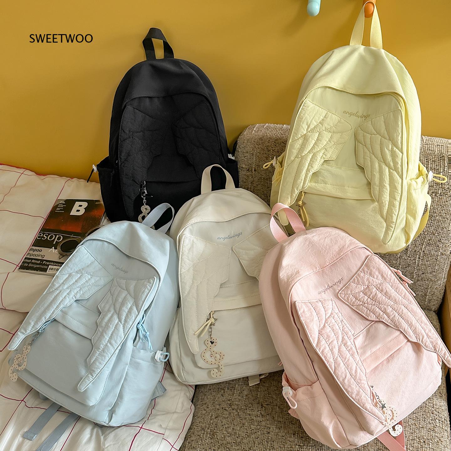 女性用ピンクエンジェルウィングリュックサック、キルト加工の翼 - Embroidery And Quilting のレビューと価格